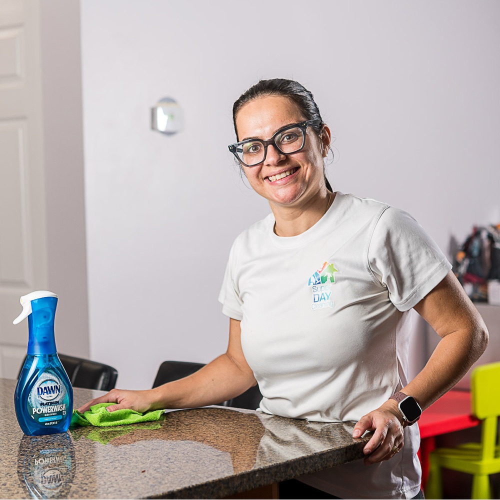 Dayane from Super Day Cleaning at work